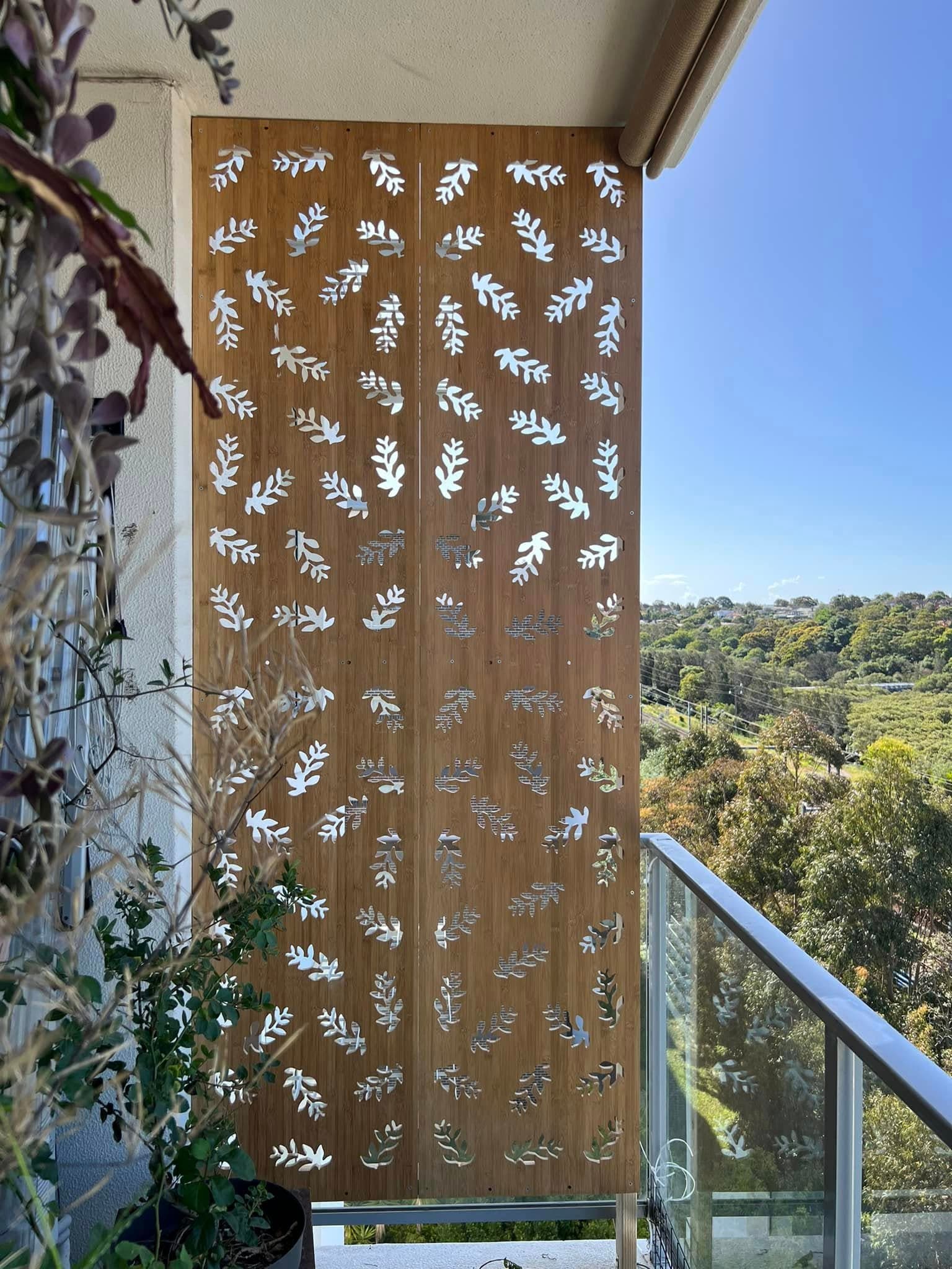 Laser-cut privacy screen fitted to a balcony